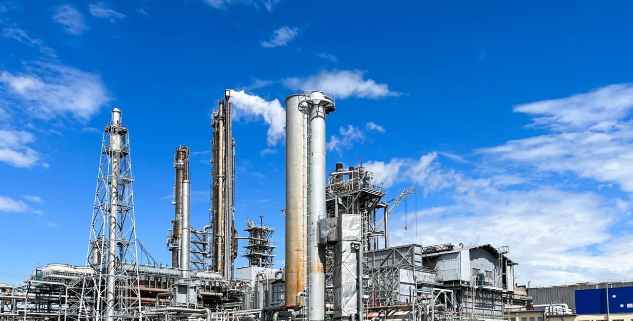 Chemical production plant under a blue sky